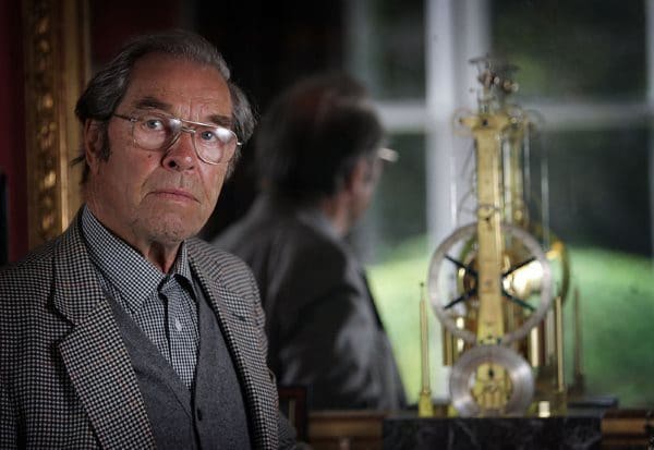 RAMSEY, UNITED KINGDOM - SEPTEMBER 17: World reknowned Watchmaker George Daniels photographed in his home next to the Breget Clock that he made. 17 September 2005, Ramsey, Isle of Man. (Photo by Christopher Furlong/Getty Images) *** Local Caption *** George Daniels